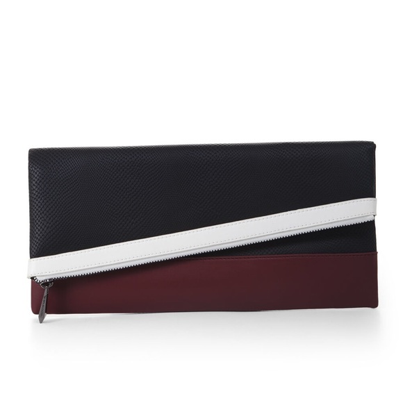 BCBGMaxAzria Handbags - BCBGMaxAzria Foldover Asymmetrical Clutch
